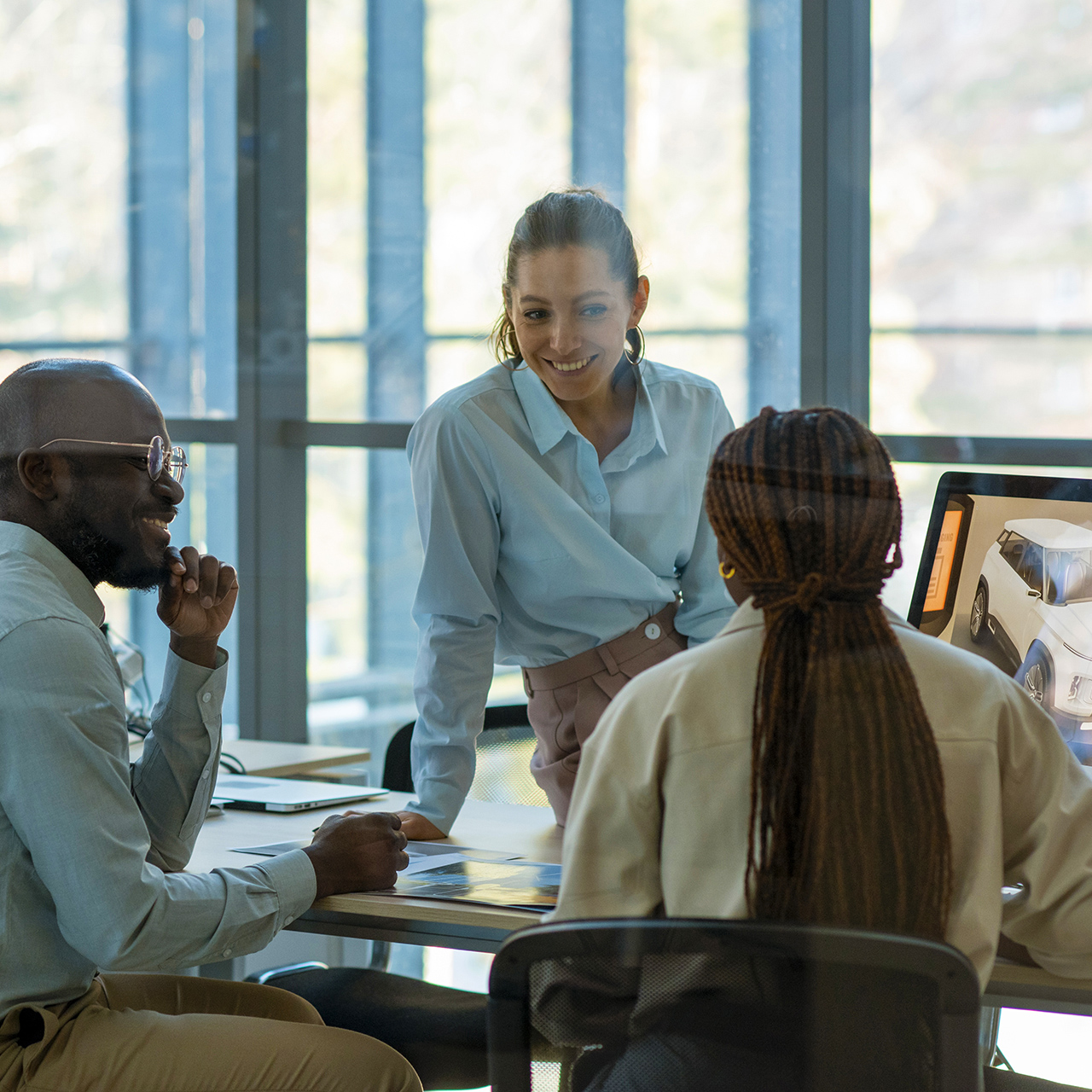 People discussing a successful project