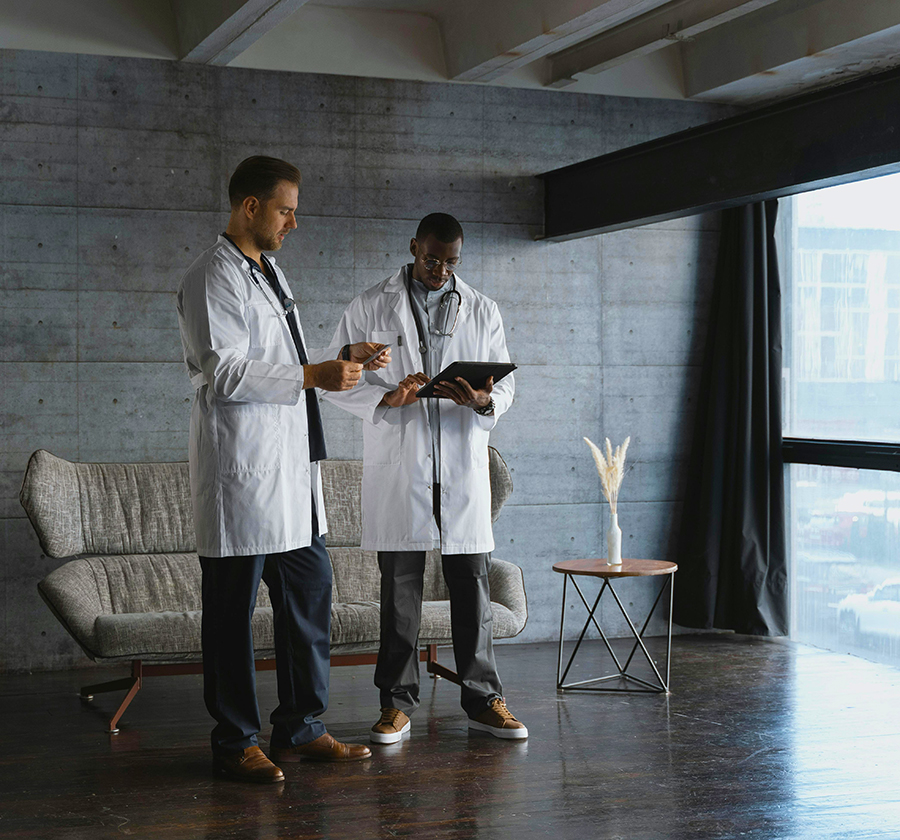 Doctors checking their patients on an iPad